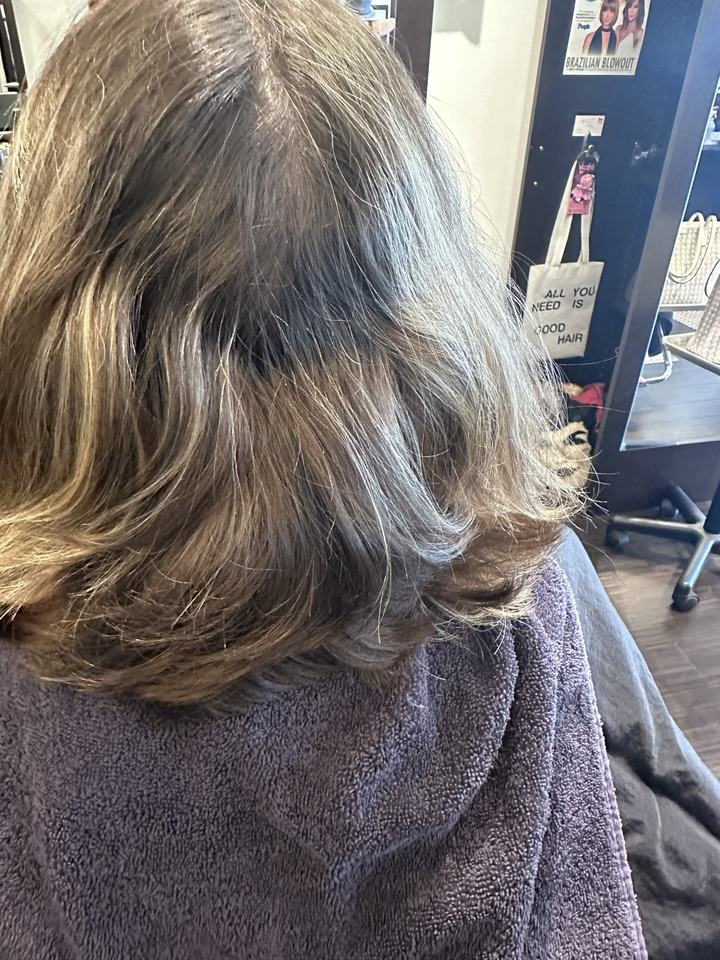 Hair before a vivid color, seen from behind